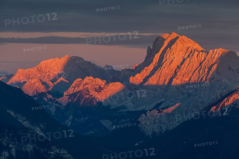 Distant view of steep mountains in the evening light, clouds, autumn, view from Wank to Karwendel Mountains, Werdenfelser Land, Upper Bavaria, Bavaria, Germany, Europe