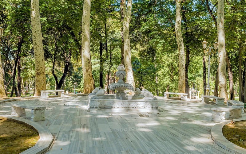 Decorative fountain on plaza in public urban park in Istanbul, Tuerkiye