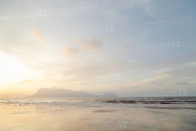 Bako national park, sea sandy beach, overcast, cloudy sunset, sky and sea, low tide. Vacation, travel, tropics concept, no people, Malaysia, Kuching, Asia