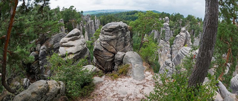 A panoramic view over bizarre rock structures surrounded by forest under a partly cloudy sky, Prachovske skaly, Prachov Rocks, Bohemian Paradise, Cesky raj, Czech Republic, Europe