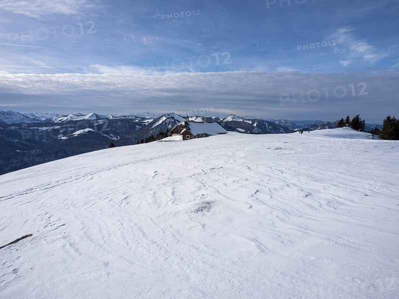 Winter atmosphere, snow-covered landscape, snow-covered alpine peaks, alpine hut on the Schafbergalm, near St. Wolfgang am Wolfgangsee, Salzkammergut, Upper Austria, Austria, Europe