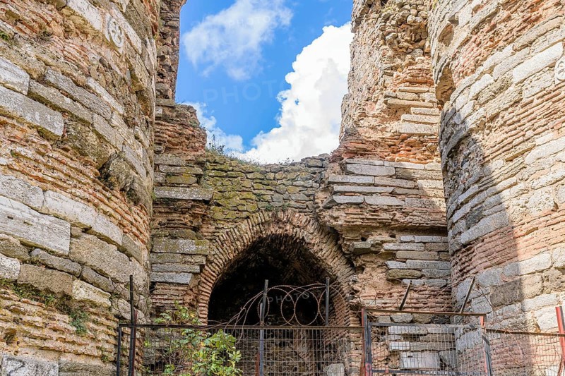 Entrance archway into ruins of ancient castle built between two towers in Istanbul, Tuerkiye