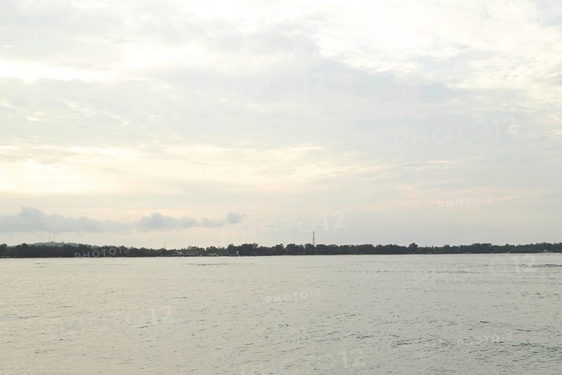 Lombok and Gili Air islands, overcast, cloudy day, sky and sea. Vacation, travel, tropics concept, no people. Sunset, sand beach