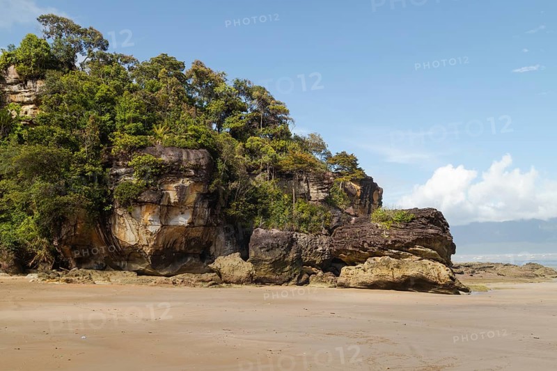 Cliff in Bako national park, sunny day, blue sky and sea. Vacation, travel, tropics concept, no people, Malaysia, Kuching, Asia