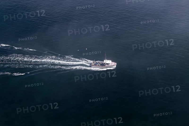 Coastal seascape, fishing boat in fog, Gulf of Saint Lawrence, Province of Quebec, Canada, sea, water, blue, North America