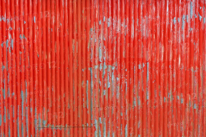 Red painted corrugated iron wall, abandoned herring factory Djupavik, Reykjarfjoerour, Strandir, Arnes, Westfjords, Iceland, Europe