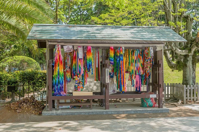 Origami steamers hanging in wooden shelter at Peace Memorial Park in Hiroshima, Japan, Asia