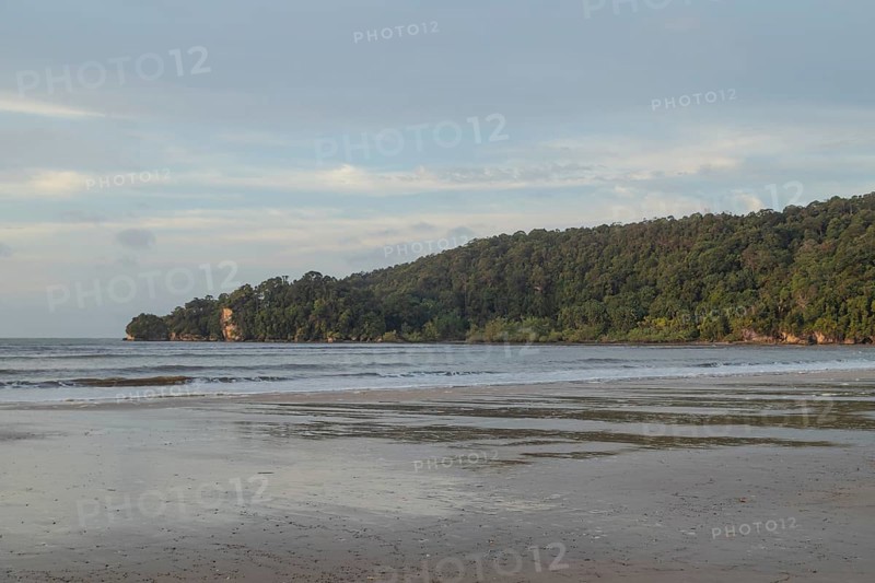 Bako national park, sea sandy beach, overcast, cloudy day, sky and sea. Vacation, travel, tropics concept, no people, Malaysia, Kuching, Asia