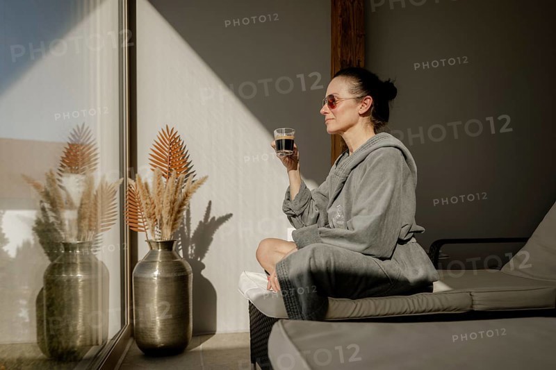 Woman enjoying coffee at a wellness centre