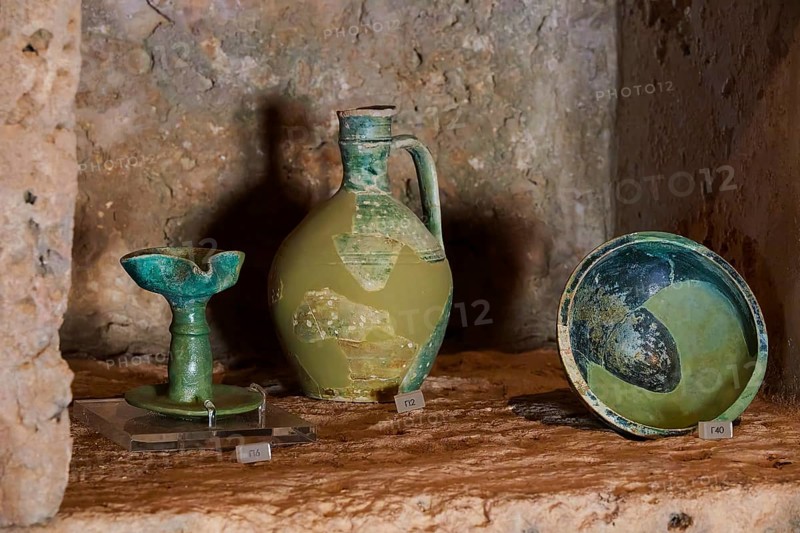 Ancient artefacts, including a vase and a bowl, displayed on a stone plinth, Museum, Chlemoutsi, High Medieval Crusader Castle, Kyllini Peninsula, Peloponnese, Greece, Europe