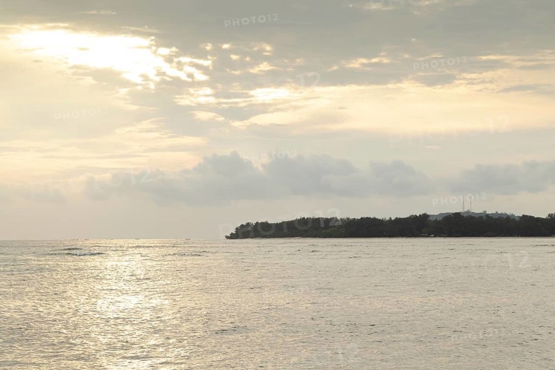 Lombok and Gili Air islands, overcast, cloudy day, sky and sea. Vacation, travel, tropics concept, no people. Sunset, sand beach