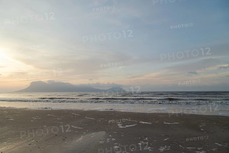 Bako national park, sea sandy beach, overcast, cloudy sunset, sky and sea, low tide. Vacation, travel, tropics concept, no people, Malaysia, Kuching, Asia