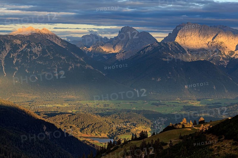 Distant view of steep mountains in the evening light, clouds, autumn, view from Wank to Karwendel Mountains, Werdenfelser Land, Upper Bavaria, Bavaria, Germany, Europe