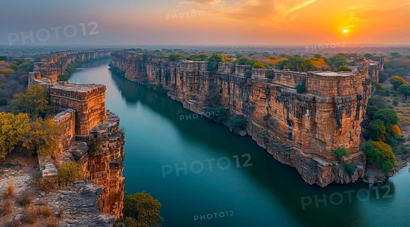Sunset over Gandikota fort on the banks of the Penner river river with cliffs in Kadapa district, Andhra Pradesh, India during golden hour, AI generated