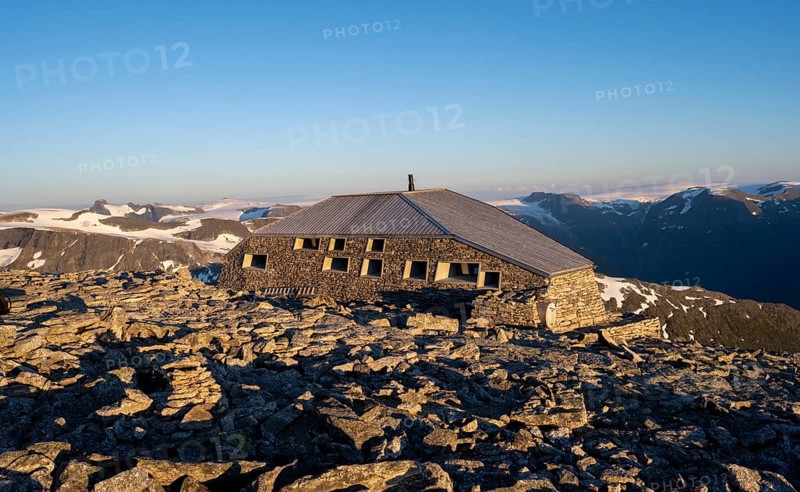 DNT's new mountain hut Skalatarnet, at the summit of Skala, at sunset, Loen, Norway, Europe