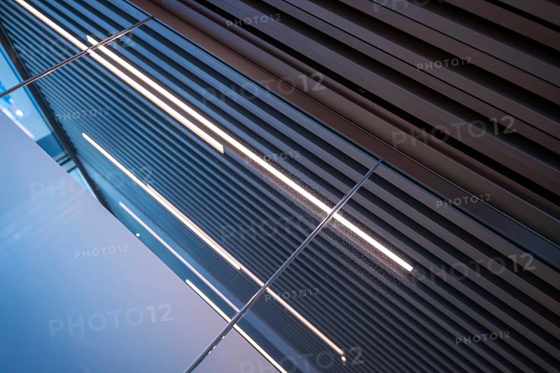 Modern Design of a Glass Wall with Metal Ceiling in Switzerland