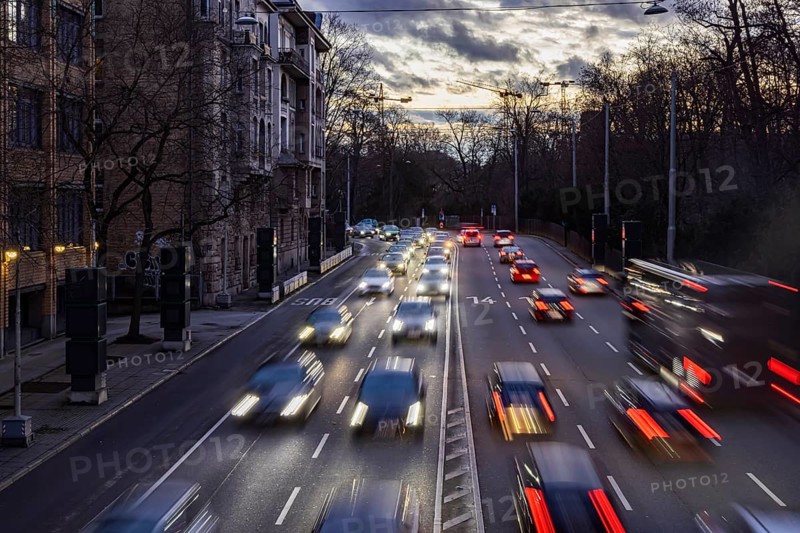Cars with light trails in the evening, city centre traffic on busy B14 federal road at Neckartor, Stuttgart, Baden-Württemberg, Germany, Europe