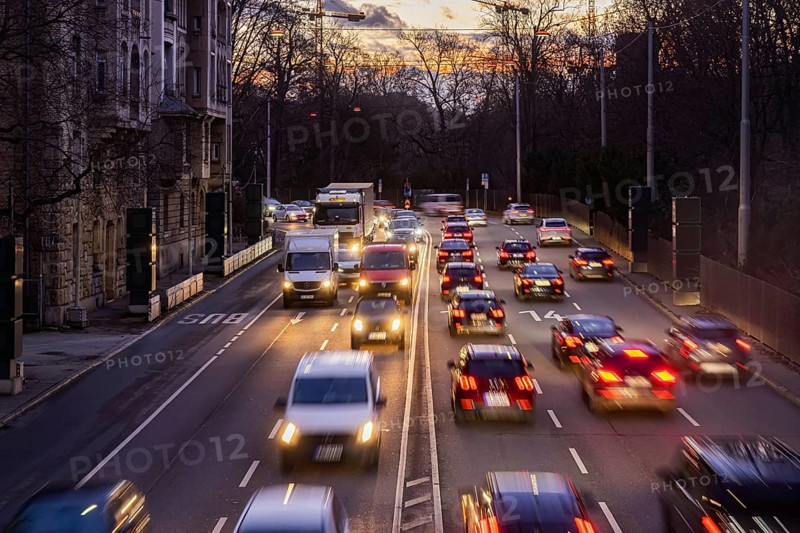Cars with light trails in the evening, city centre traffic on busy B14 federal road at Neckartor, Stuttgart, Baden-Württemberg, Germany, Europe