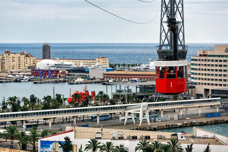 View from a red gondola, Teleferic de Montjuic cable car, Port Vell, Barcelona, Spain, Europe