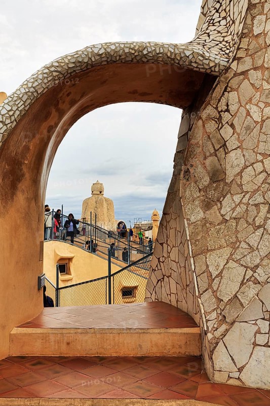 Tourists between artistically designed fireplaces on the roof terrace in the museum, Garden of the Warriors, cultural centre, Casa Mila, Casa Milà, Barcelona, Spain, Europe