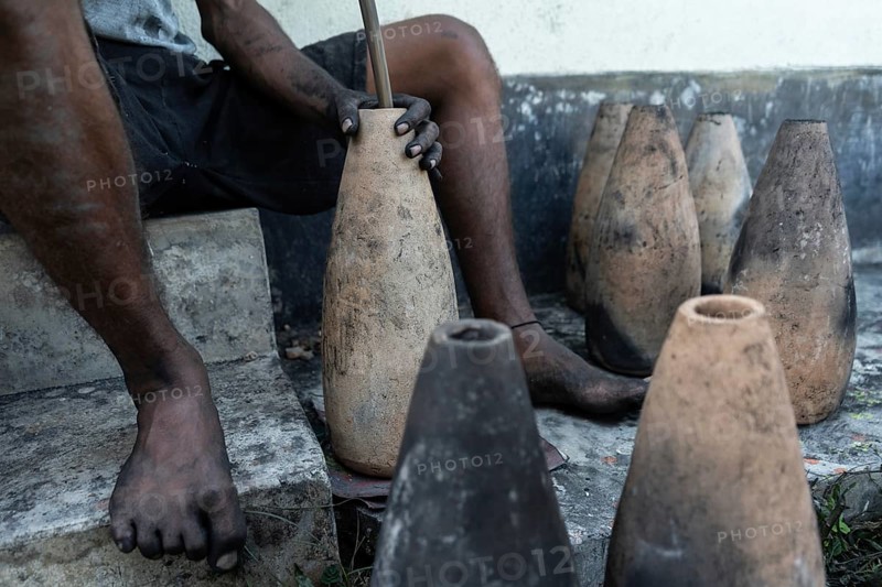 BARPETA, INDIA, NOVEMBER 7: Workers making firecrackers at a workshop for upcoming Diwali or Dipawali festival on November 7, 2023. in Barpeta, India. Diwali is a festival of lights, often involving fireworks, celebrated every year in India. Barpeta village of lower Assam is famous for making handmade traditional firecrackers