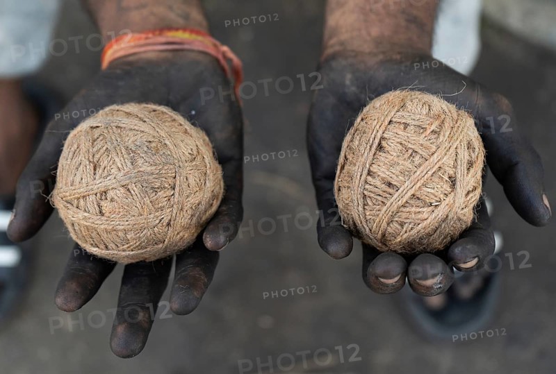 BARPETA, INDIA, NOVEMBER 7: Workers making firecrackers at a workshop for upcoming Diwali or Dipawali festival on November 7, 2023. in Barpeta, India. Diwali is a festival of lights, often involving fireworks, celebrated every year in India. Barpeta village of lower Assam is famous for making handmade traditional firecrackers