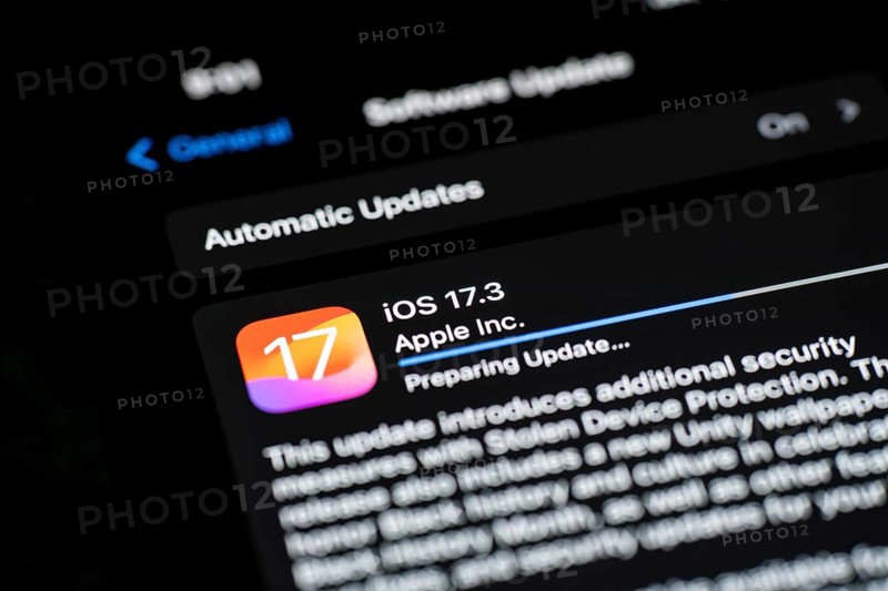 In this photo illustration a person installs updates of iOS 17.3 on an iPhone device on January 26, 2024 in Guwahati, India. Apple has launched a new security feature -Protection for stolen device, to protect personal data, including money apps and personal photos in the new 17.3 iOS update