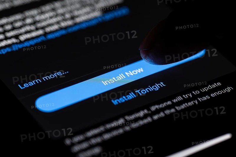 In this photo illustration a person installs updates of iOS 17.3 on an iPhone device on January 26, 2024 in Guwahati, India. Apple has launched a new security feature -Protection for stolen device, to protect personal data, including money apps and personal photos in the new 17.3 iOS update