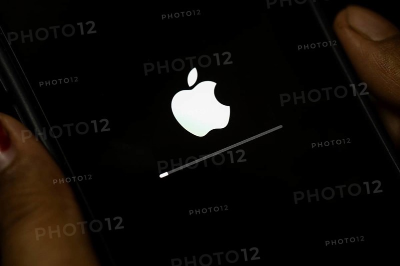 In this photo illustration a person installs updates of iOS 17.3 on an iPhone device on January 26, 2024 in Guwahati, India. Apple has launched a new security feature -Protection for stolen device, to protect personal data, including money apps and personal photos in the new 17.3 iOS update