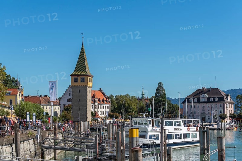 Lindau on Lake Constance, seaport, passenger ship, many holidaymakers, crowd, lakeside promenade, man tower, tax office, Bavaria, Germany, Europe