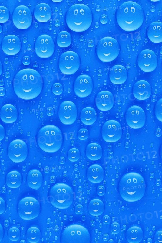 Lots of funny little blue water drops on a blue surface, a smiley face reflected in each drop