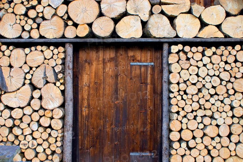 Picturesque woodpile, more for decoration, sawn logs, at a wooden hut near Garmisch-Partenkirchen, Bavaria, Germany, Europe