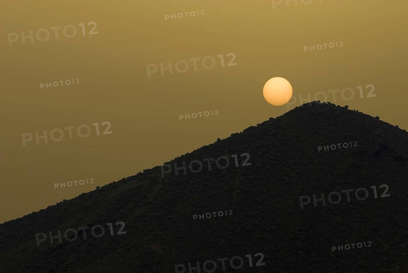 The sun on Tenerife on a volcanic hill, obscured by sahara dust, calima, Canary Islands, Spain, Europe
