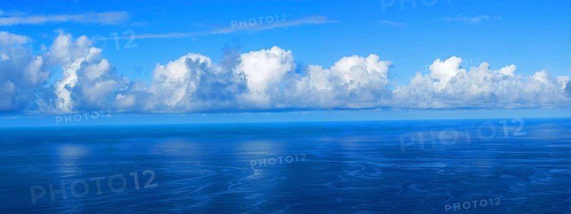 View over the blue Atlantic Ocean with white clouds, panoramic shot, from the mountain slopes near Barlovento, La Palma, Canary Islands, Spain, Europe