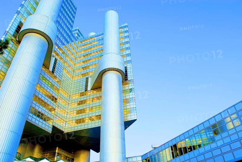 HVB Tower or Hypo-Haus, headquarters of Hypovereinsbank, Unicredit, in Arabellapark at dusk, blue hour, Munich, Bavaria, Germany, Europe