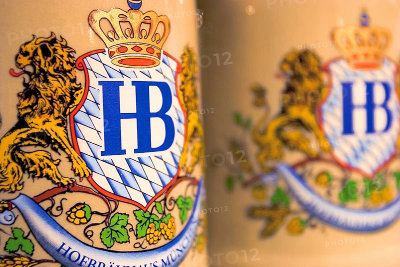 The Hofbräu brewery's coat of arms on a stone beer mug in the Hofbräuhaus souvenir store, Munich, Bavaria, Germany, Europe