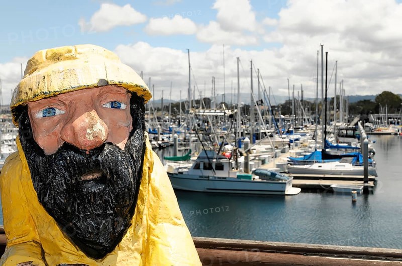 Fisherman, sculpture, wooden figure in the harbour, Monterey, California, USA, North America