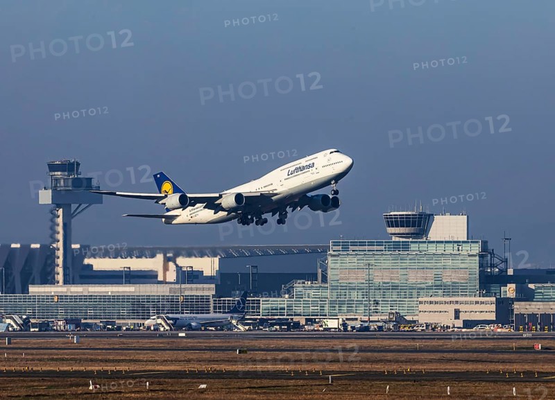 Aircraft taking off at Frankfurt Airport, Fraport Airport with tower. D-ABYH, LUFTHANSA, BOEING 747-830, Frankfurt am Main, Hesse, Germany, Europe
