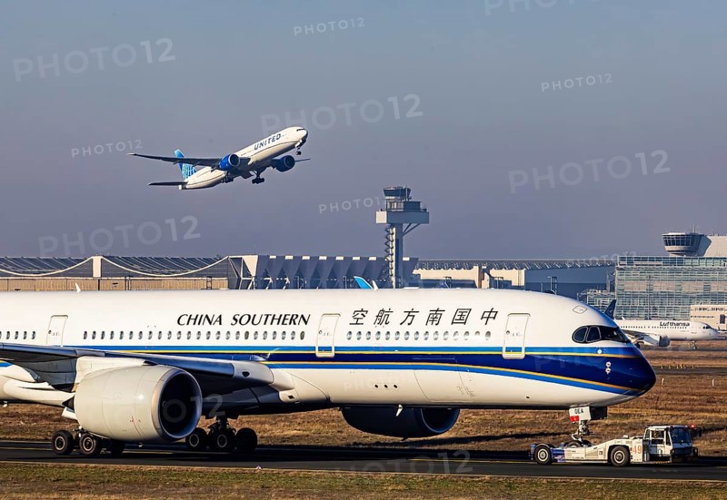 United Airlines aircraft taking off at Frankfurt Airport, Fraport Airport with tower. B-30EA, CHINA SOUTHERN AIRLINES, AIRBUS A350-941, Frankfurt am Main, Hesse, Germany, Europe