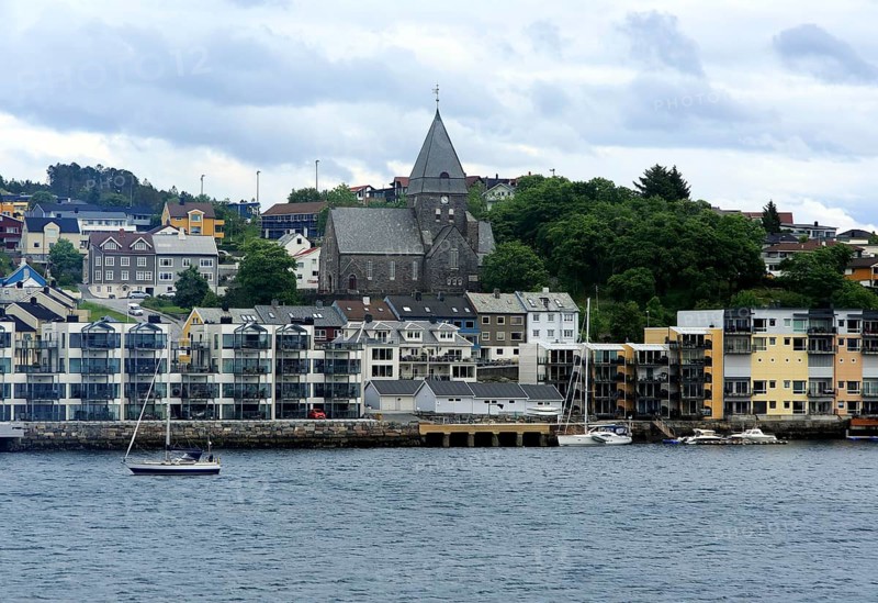 Houses and church in coastal town of Kristiansund, Romsdal county, Norway, Europe