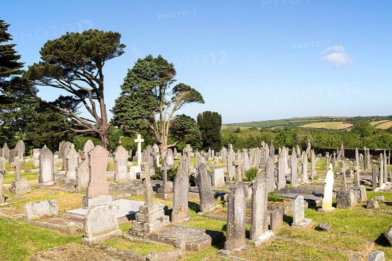 Gravestones in churchyard parish church at St Keverne, Lizard Peninsula, Cornwall, England, UK