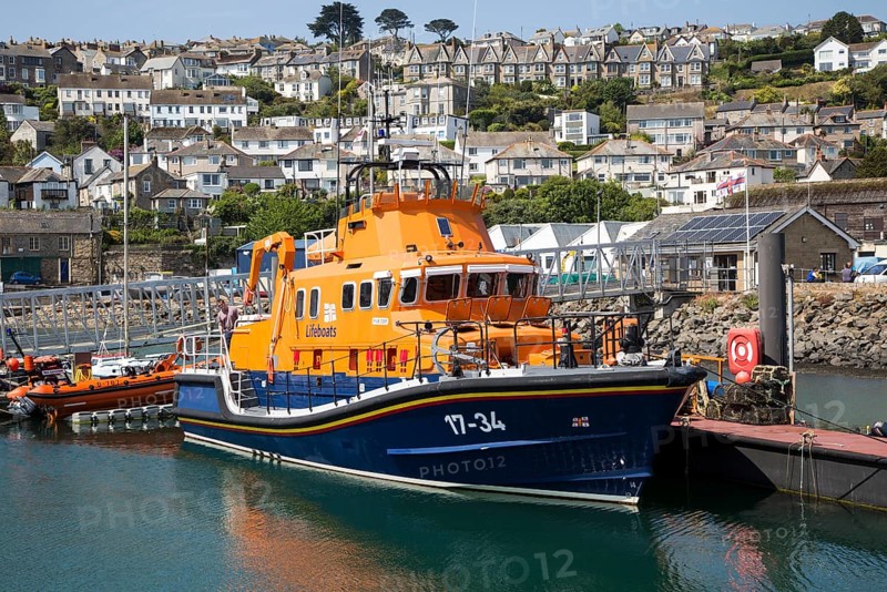 RNLI lifeboat in the harbour of fishing port of Newlyn, Cornwall, England, UK