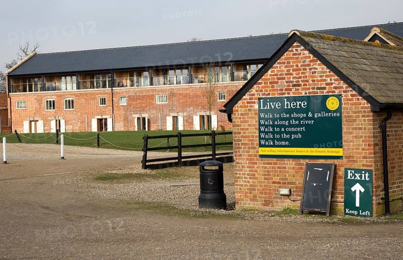 Former industrial buildings converted into housing for sale, Snape Maltings, Suffolk, England, UK