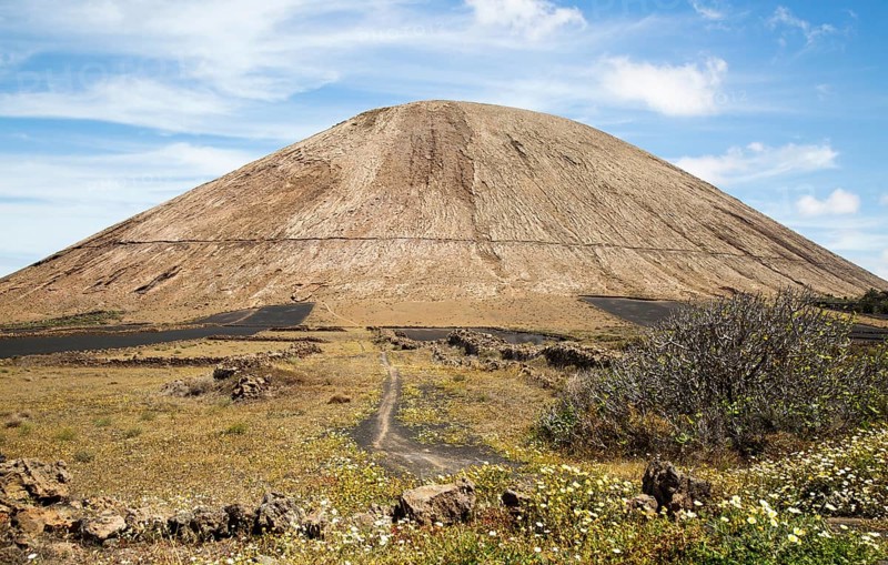 Volcano cone and black volcanic soil farmland, near Tinajo, Lanzarote, Canary Islands, Spain, Montana Tinache, Europe