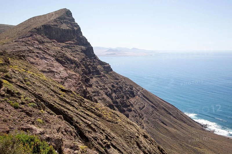 Steep coastal cliffs Risco de Famara looking south from Guinate, Lanzarote, Canary Islands, Spain, Europe