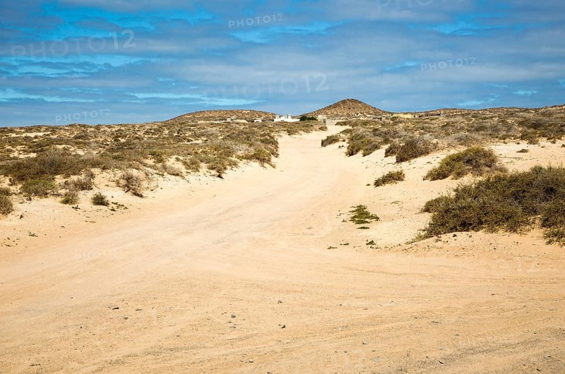 Inland sand dune landscape with unsealed sandy dirt roads La Isla Graciosa, Lanzarote, Canary Islands, Spain, Europe