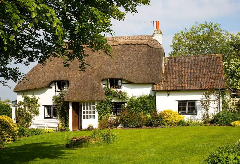 Pretty historic thatched cottage and garden, Cherhill, Wiltshire, England, UK