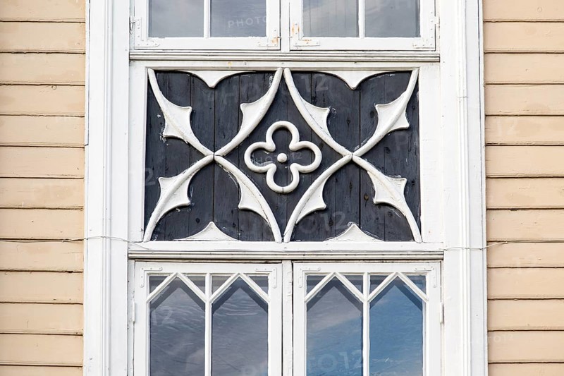 Detail of wood windows, historic wooden cathedral church in city centre, Tromso, Norway, Europe