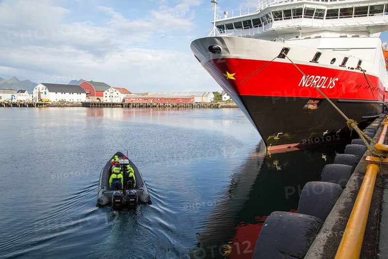 Nordlys Hurtigruten ferry ship at Svolvaer, Lofoten Islands, Nordland, Norway -adventure expedition boat setting off