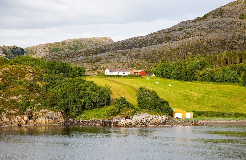 Rural coastal farming landscape near Rorvik, Norway, Europe